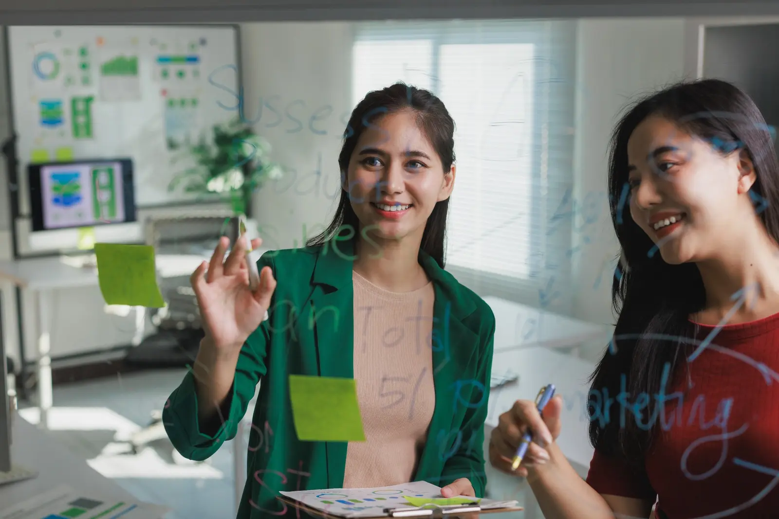 Professional colleagues collaborating on business processes in a modern office